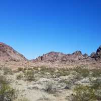 Hills with shrubs landscapes in the desert