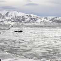 Icy Ocean and hills 