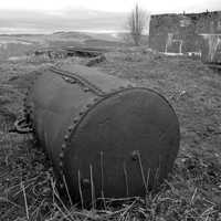 Metal cylinder in the landscape black and white