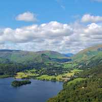 Overlook landscape with clouds and pond