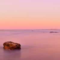 Pink sunset on the beach of Castillo en el Mar