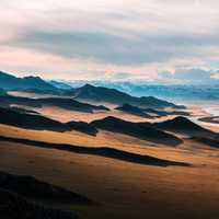 Prairie and Badlands landscape with highway and road