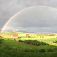 Rainbow Arcing over the Sky and Farms