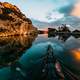 Rowing a Canoe down the scenic river