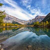 Scenery with lake reflections with clouds in the sky