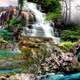 Scenic Waterfall cascading down in garden