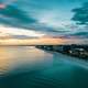 Shoreline nearby a city dusk landscape