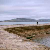 Stone walkway out into the lake