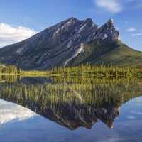 Sukakpak Mountain and reflective Lake in Alaska