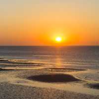 Sunset and orange sky over the ocean