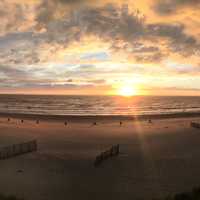 Sunset on the beach with clouds