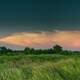 Sunset over grasslands and sky