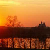 Sunset over the castle and the water