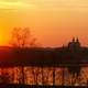 Sunset over the castle and the water