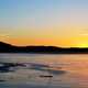 Sunset over the Frozen Lake