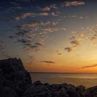 Sunset over the ocean and orange skies