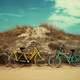 Bikes near a sand dune
