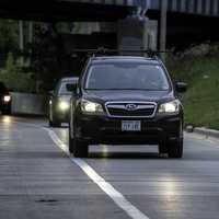 Car and traffic on the road coming towards me