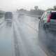 Cars Driving on a rainy day