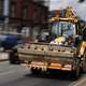 Caterpillar tractor going down the road