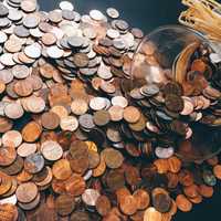 Coins coming out of a jar