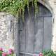 Door with flowers around it