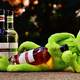 Kermit with a bottle of wine