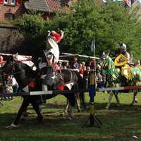 Knight riding on horse at medieval festival
