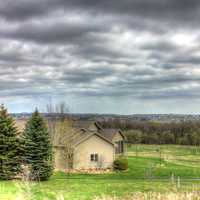 Landscape, house and clouds