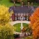 Mansion with autumn trees