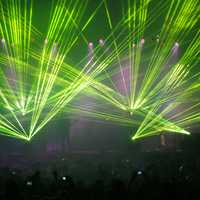 Laser light show of green during a concert