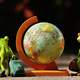 Miniature Globe with two frogs
