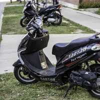 Motorcycle parked on the sidewalk