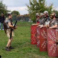 People Dress up as medieval knights and shields