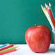 Primary school pencils and apple