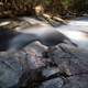 Rapidly flowing water cascading down rocks