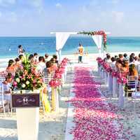 Seaside Wedding with rose walkway