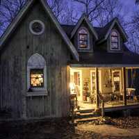 Small Cottage in the Woods with Porch light