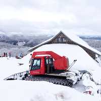 Snow covered Roof with tractor