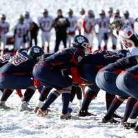 american-football-team-playing-in-the-snow