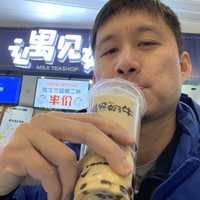 Asian guy drinking Bubble Tea