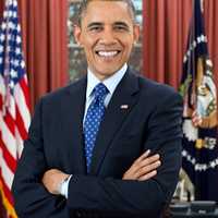 President Barack Obama is photographed during a presidential portrait sitting for an official photo in the Oval Office, Dec. 6, 2012.  (Official White House Photo by Pete Souza)