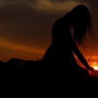 beautiful-woman-silhouette-at-sunset