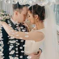 bride-and-groom-kissing-at-a-wedding