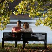 Couple sitting on the park bench