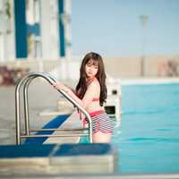 cute-asian-girl-stepping-out-of-the-pool