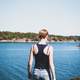 girl-looking-across-the-lake-in-grinda-sweden