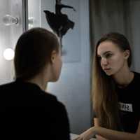 girl-looking-into-the-mirror