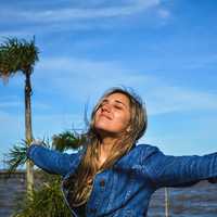 girl-smiling-and-enjoying-the-good-weather