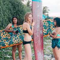 girls-in-bathing-suits-and-surfboards